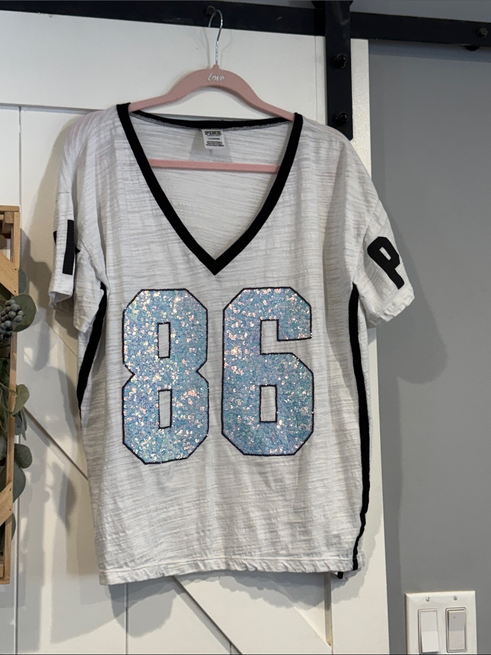 PINk White V-Neck Tee with Blue Sequin '86' size large (generous)